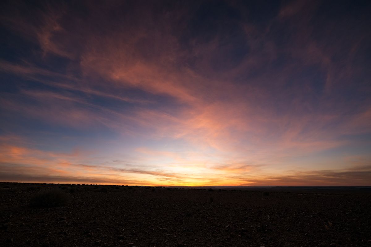 Sunset clouds glowing over the desert