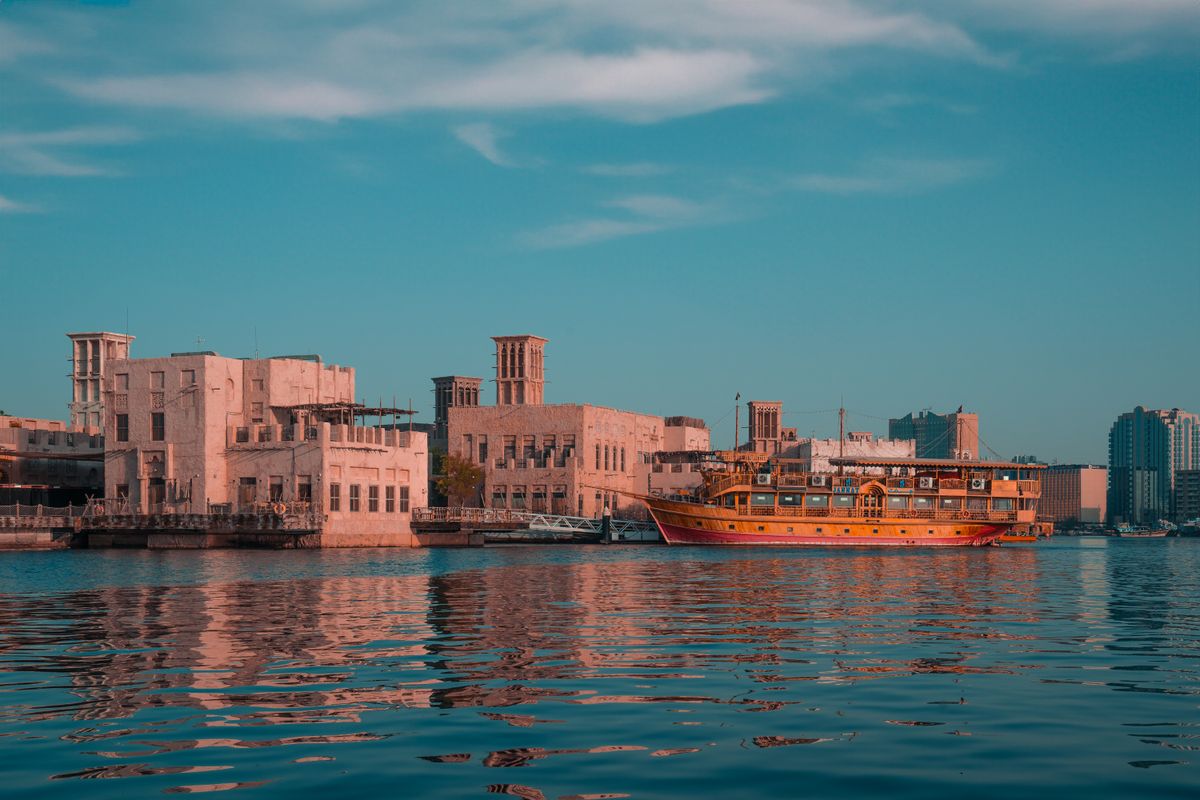 A traditional dhow on the Creek as the sun sets