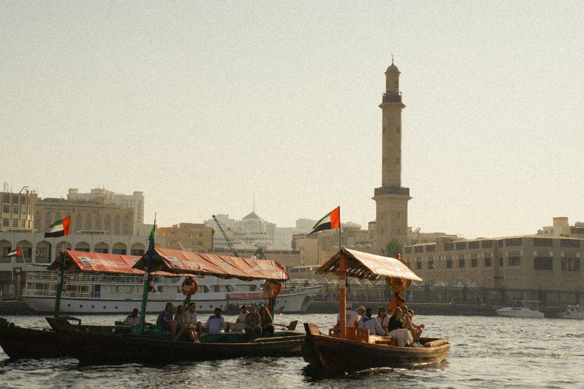 Boats passing the old town’s minarets on the canal