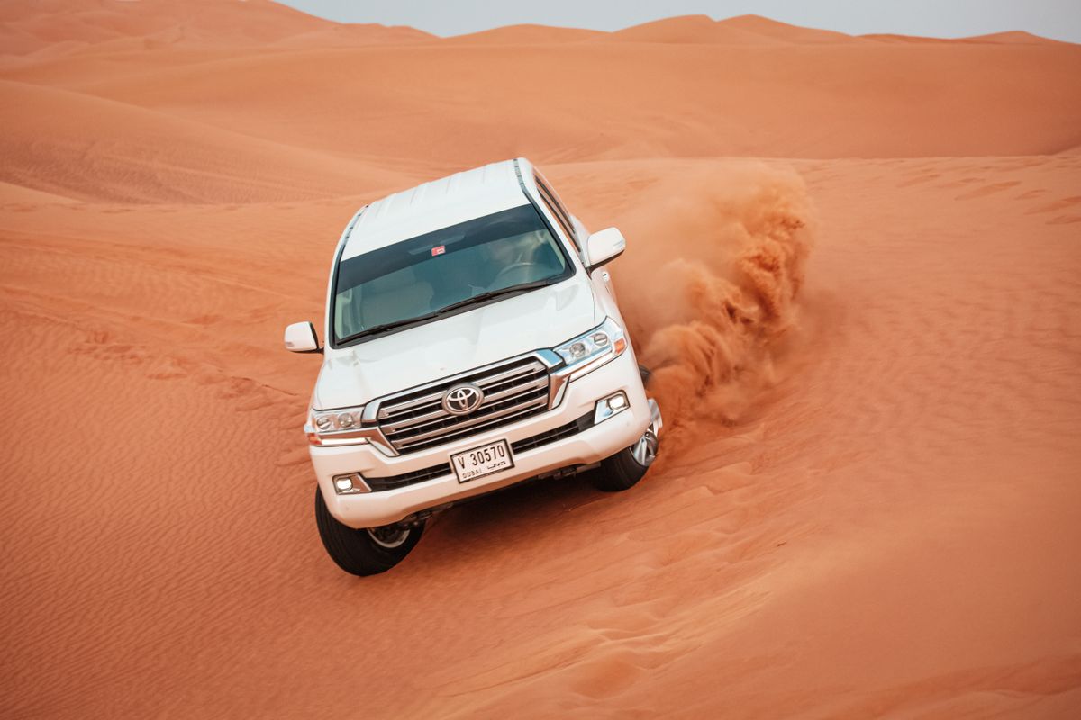 The Land Cruiser taking on a steep dune face