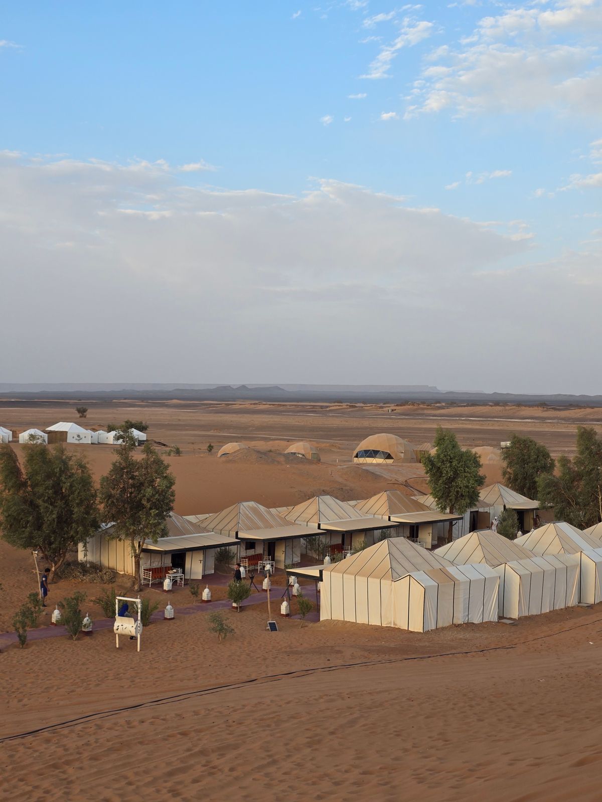 A private luxury camp amid rolling desert sands